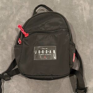 Jordan Black Backpack with Red Accents